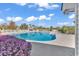 Community pool area surrounded by lounge chairs and tables at 701 Wilshire Ln. # 0, Murrells Inlet, SC 29576