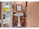 Charming powder room features a pedestal sink, decorative mirror, and warm-toned walls at 701 Wilshire Ln. # 0, Murrells Inlet, SC 29576