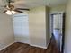 Bedroom featuring a ceiling fan, wood-look flooring, and closet at 753 Bucklin Loop, Myrtle Beach, SC 29579