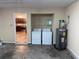 Garage featuring laundry, shelving, and water heater at 753 Bucklin Loop, Myrtle Beach, SC 29579