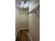 Walk-in closet with wire shelving and wood-look floors at 753 Bucklin Loop, Myrtle Beach, SC 29579