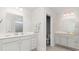 Bright bathroom featuring double vanity, with modern fixtures and a view into the water closet at 768 Choctaw Dr., Conway, SC 29526