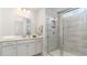 Elegant bathroom with a glass shower, a wide mirror, and modern fixtures at 768 Choctaw Dr., Conway, SC 29526