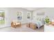 Bright bedroom with natural light, rattan accents, and a view of outdoor space at 768 Choctaw Dr., Conway, SC 29526