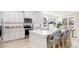 Modern kitchen featuring white cabinets, stainless steel appliances, and a breakfast bar with seating at 768 Choctaw Dr., Conway, SC 29526