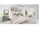 Bright main bedroom with large windows, stylish decor, and comfortable furnishings at 768 Choctaw Dr., Conway, SC 29526