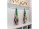 Mudroom features a hall tree with hooks, storage, and charming wall art at 768 Choctaw Dr., Conway, SC 29526