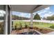 Inviting covered patio with seating overlooking a spacious, fenced yard at 768 Choctaw Dr., Conway, SC 29526