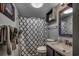 Modern bathroom featuring a shower with a stylish curtain, gray walls, and nautical decorations at 806 N Waccamaw Dr. # 304, Garden City Beach, SC 29576