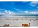 Picturesque beachfront scene with clear skies, tranquil waves, and a serene atmosphere, perfect for vacation at 806 N Waccamaw Dr. # 304, Garden City Beach, SC 29576