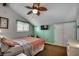 Cozy bedroom with sloped ceilings, a ceiling fan, and a window with blinds at 806 N Waccamaw Dr. # 304, Garden City Beach, SC 29576