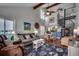 Open living room features vaulted ceilings, a spiral staircase, and seamless access to the kitchen at 806 N Waccamaw Dr. # 304, Garden City Beach, SC 29576