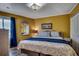 Comfortable bedroom featuring stylish decor, a large window, and a coordinated color scheme at 806 N Waccamaw Dr. # 304, Garden City Beach, SC 29576