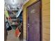 Photo of a packed storage closet and a brown apartment door with the number 304 on it at 806 N Waccamaw Dr. # 304, Garden City Beach, SC 29576
