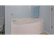 Elegant bathroom with a relaxing soaking tub, tiled surround, and modern fixtures at 816 Barn Owl Ct. # 816, Myrtle Beach, SC 29579