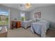 Inviting bedroom with twin beds, ample natural light, and a cozy atmosphere at 816 Barn Owl Ct. # 816, Myrtle Beach, SC 29579