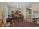 Charming dining area with classic furnishings, a decorative rug, and a view into the kitchen at 816 Barn Owl Ct. # 816, Myrtle Beach, SC 29579