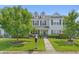 Inviting two-story home with lush landscaping and a neatly kept lawn, showcasing curb appeal at 816 Barn Owl Ct. # 816, Myrtle Beach, SC 29579