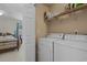 Efficient laundry room with modern washer and dryer, offering convenience and organization at 816 Barn Owl Ct. # 816, Myrtle Beach, SC 29579