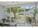 Screened porch providing a peaceful outdoor space with views of the landscaped yard and neighboring homes at 816 Barn Owl Ct. # 816, Myrtle Beach, SC 29579