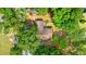 Aerial view showcasing the home's layout, mature trees, and convenient parking at 8506 Old Nichols Hwy., Nichols, SC 29581