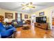 Spacious living room with hardwood floors, comfortable seating, and bright natural light at 8506 Old Nichols Hwy., Nichols, SC 29581