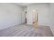 Bedroom with carpet flooring and attached bathroom and closet at 8761 Nw Nashville Dr., Calabash, NC 28467