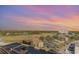 Scenic aerial view of condos, with marsh views, parking and a stunning pastel sky at 9550 Shore Dr. # 1418, Myrtle Beach, SC 29572