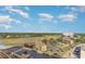 Beautiful aerial view of the marsh, community, and resort amenities under a blue sky at 9550 Shore Dr. # 1418, Myrtle Beach, SC 29572