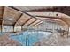 Enjoy an indoor pool with wood vaulted ceilings and views of the outdoor scenery at 9550 Shore Dr. # 1418, Myrtle Beach, SC 29572