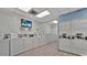 Clean and bright laundry room featuring rows of both new and updated machines on clean tile floor at 9550 Shore Dr. # 1418, Myrtle Beach, SC 29572