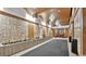 A grand, well lit lobby featuring unique chandelier lighting, marble walls, and a statue over a planted garden at 9550 Shore Dr. # 1418, Myrtle Beach, SC 29572
