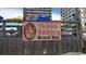 Photo of Ocean Annie's Beach Bar sign on a wooden fence at 9550 Shore Dr. # 1418, Myrtle Beach, SC 29572