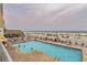 Relax by the outdoor pool with a view of the beach and ocean activities at 9550 Shore Dr. # 1418, Myrtle Beach, SC 29572