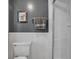 Bathroom featuring white wainscoting, toilet, and frameless glass shower at 97 Shadow Moss Pl. # 97, North Myrtle Beach, SC 29582