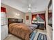 Cozy main bedroom featuring a ceiling fan and beautiful natural light at 97 Shadow Moss Pl. # 97, North Myrtle Beach, SC 29582