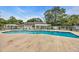 The outdoor community pool with seating and lounge chairs for relaxing by the water at 97 Shadow Moss Pl. # 97, North Myrtle Beach, SC 29582