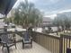 Balcony with seating overlooking nearby condos and greenery at 10200 Lake Shore Dr. # 4, Myrtle Beach, SC 29572