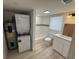Clean bathroom with subway tile, updated fixtures, and a convenient washer/dryer combo at 1022 Holt Rd., Conway, SC 29526