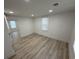 An empty bedroom with neutral paint, recessed lighting and wood-look floors at 1022 Holt Rd., Conway, SC 29526
