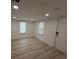 Light filled bedroom showcasing neutral walls, recessed lighting and light hardwood floors at 1022 Holt Rd., Conway, SC 29526