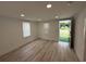 Bright living room with wood floors, neutral walls, and ample natural light at 1022 Holt Rd., Conway, SC 29526