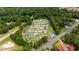 Aerial view of homes in a community surrounded by dense trees, and a quiet setting at 104 Browns Hollow Ct., Loris, SC 29569
