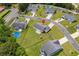 Aerial view of the house showcasing the large yard, patio, and playground at 104 Browns Hollow Ct., Loris, SC 29569