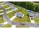 Aerial view of a home, showcasing the backyard with pool and surrounding neighborhood at 104 Browns Hollow Ct., Loris, SC 29569