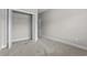 Bedroom with carpet and closet, showcasing a clean and simple design with fresh paint at 104 Browns Hollow Ct., Loris, SC 29569