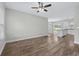 View of an open concept living room with sleek floors and a ceiling fan at 104 Browns Hollow Ct., Loris, SC 29569