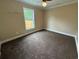 Neutral bedroom features a ceiling fan and window offering natural light at 1041 Morning Dale St., Conway, SC 29526