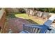 This backyard shows the grass, brick patio, and wooden fence surrounding the property at 1089 Weslin Creek Dr., Myrtle Beach, SC 29588