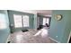 This is a bright dining room, filled with natural light from large windows, creating an inviting space at 1089 Weslin Creek Dr., Myrtle Beach, SC 29588